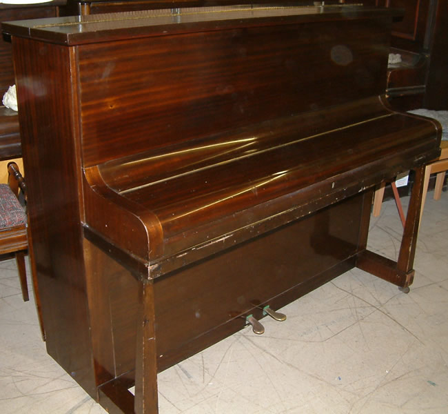 Challen before being restored upright piano