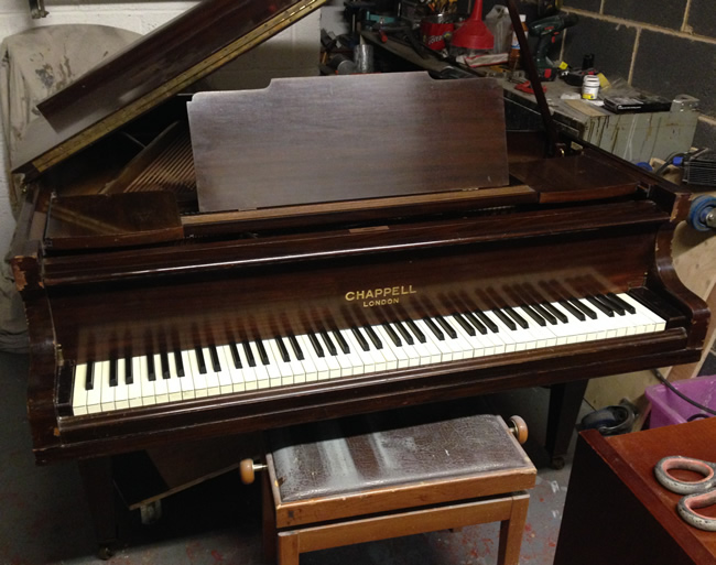 Chappell baby grand piano. 