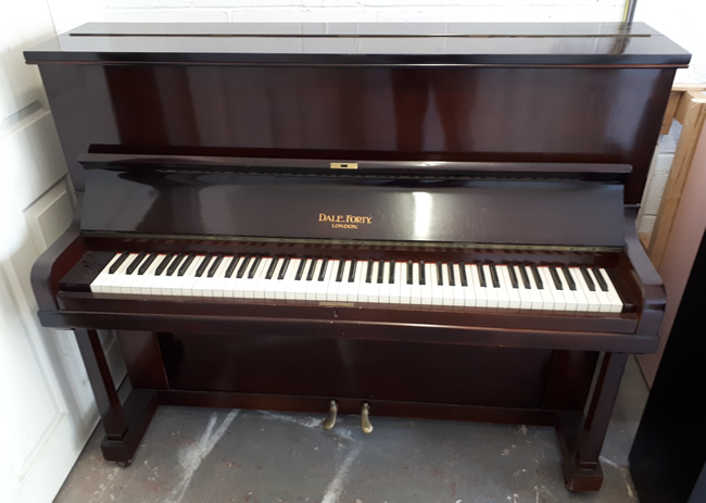 Dale Forty traditional upright piano.