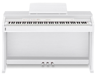 White Celviano AP460 digital pianos.