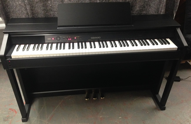 Black satin digital piano.