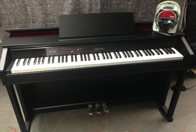 Digital piano with headphones.