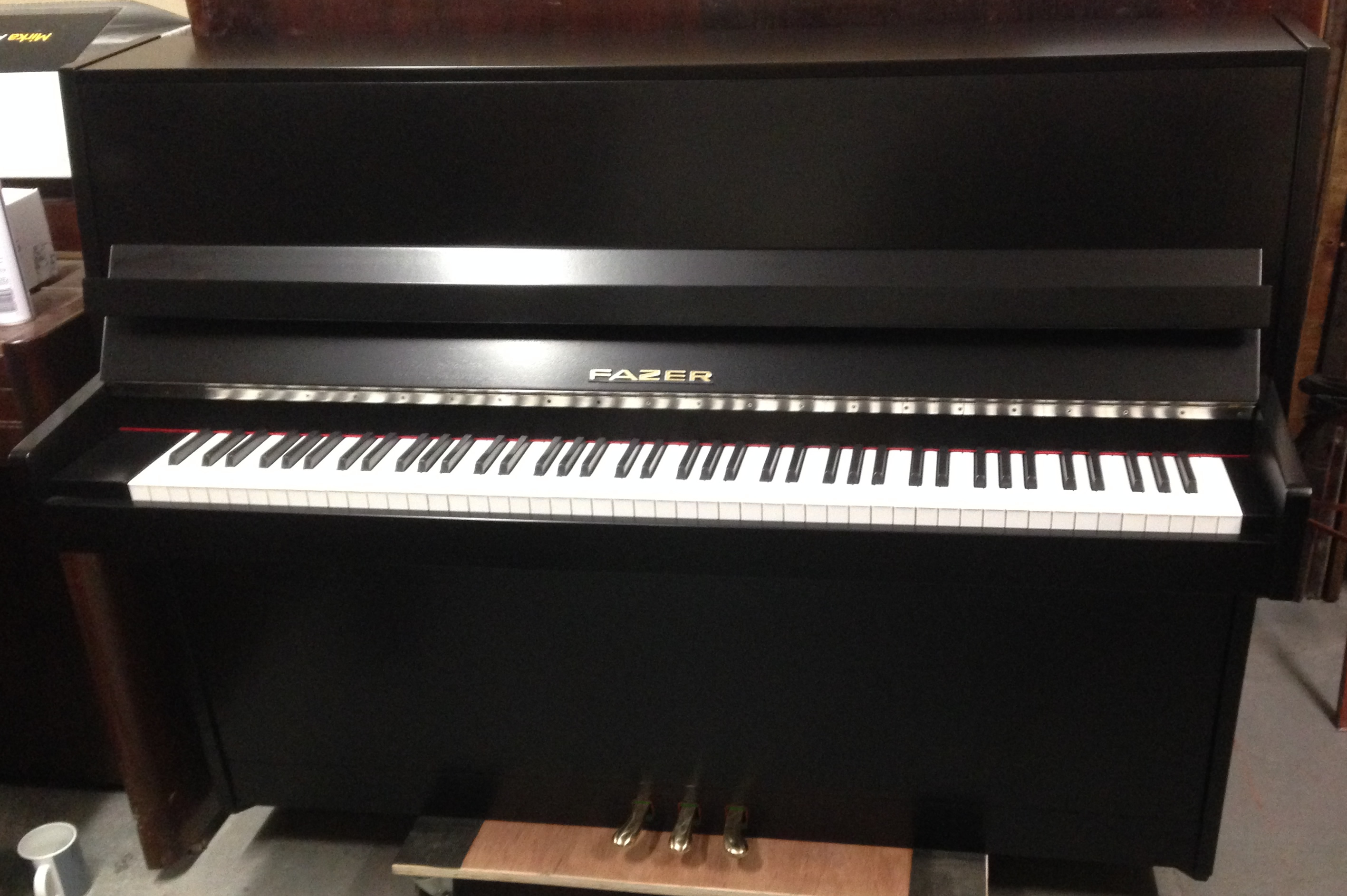 Fazer piano in a black satin finish.