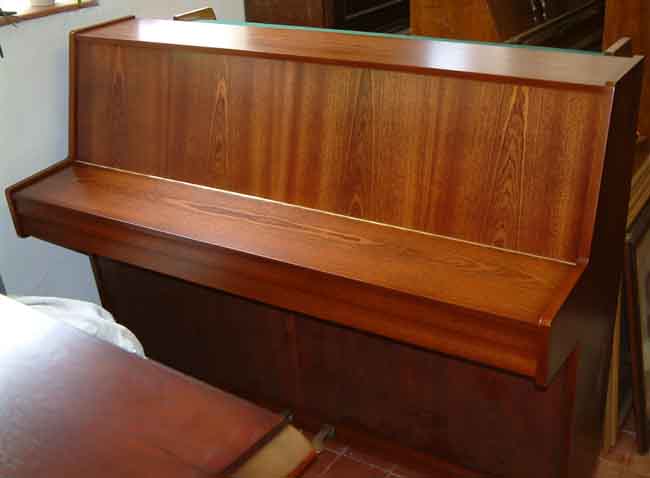 Re-polished mahogany upright piano