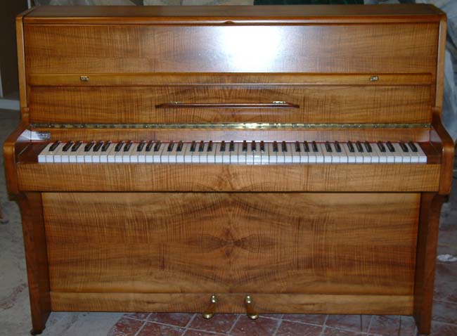 Jermyn walnut piano restored