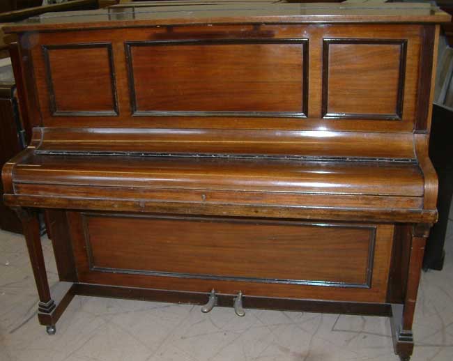 Rogers traditional upright  in a Fiddleback Mahogany cabinet