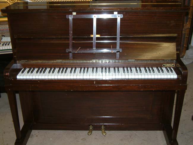 Brinsmead traditional upright  in a Mahogany cabinet