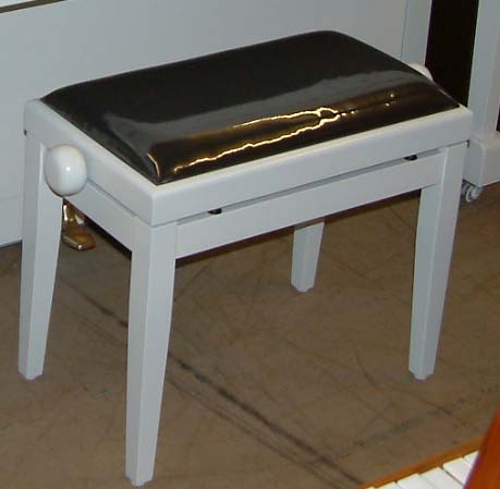 White piano stool
