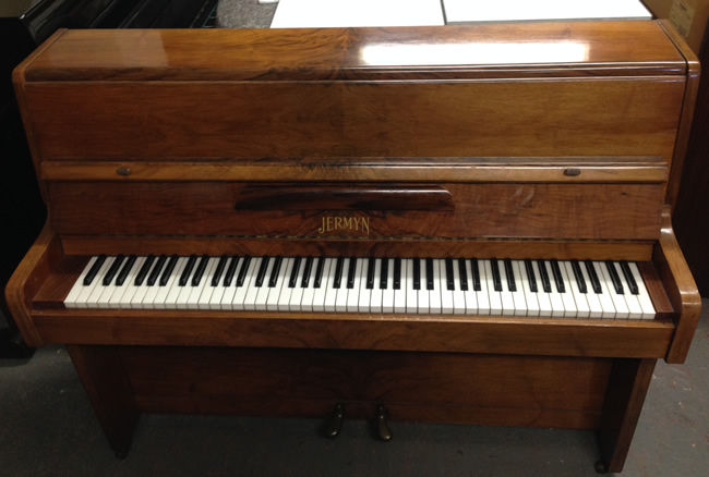 Jermyn Walnut restored piano.