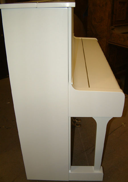 White Yamaha Piano in a High Gloss Finish