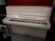 Kemble english upright piano.