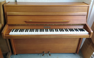 Knight upright piano for rent.