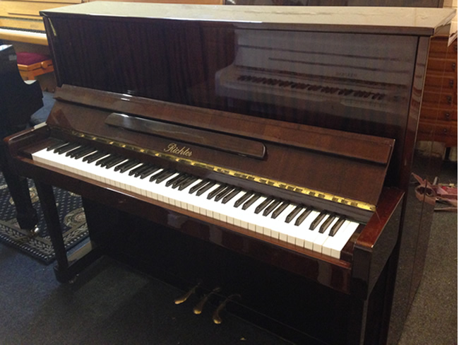 Richter upright piano in a Mahogany cabinet. 