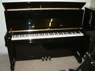 Kauffman black gloss new piano