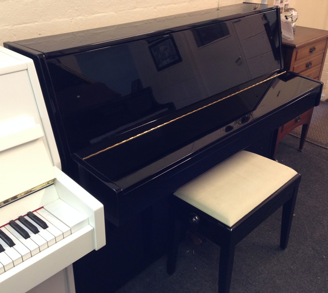 Opus small modern upright piano in a Black High Gloss