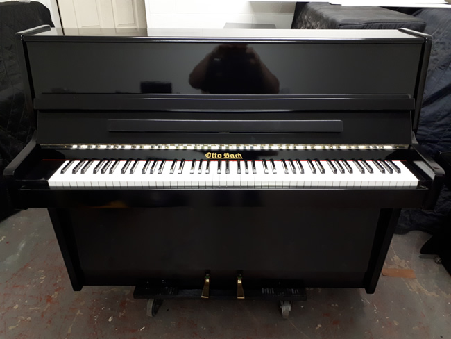 Ottobach gloss black piano.