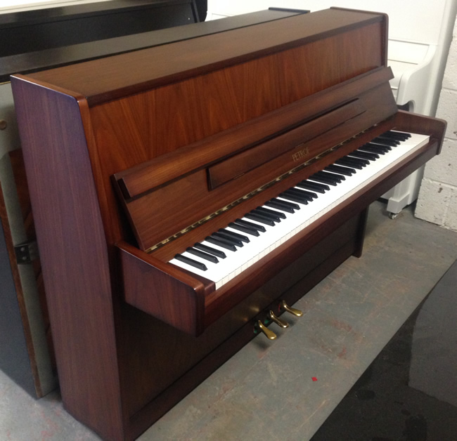 Petrof modern piano restored and repolished.