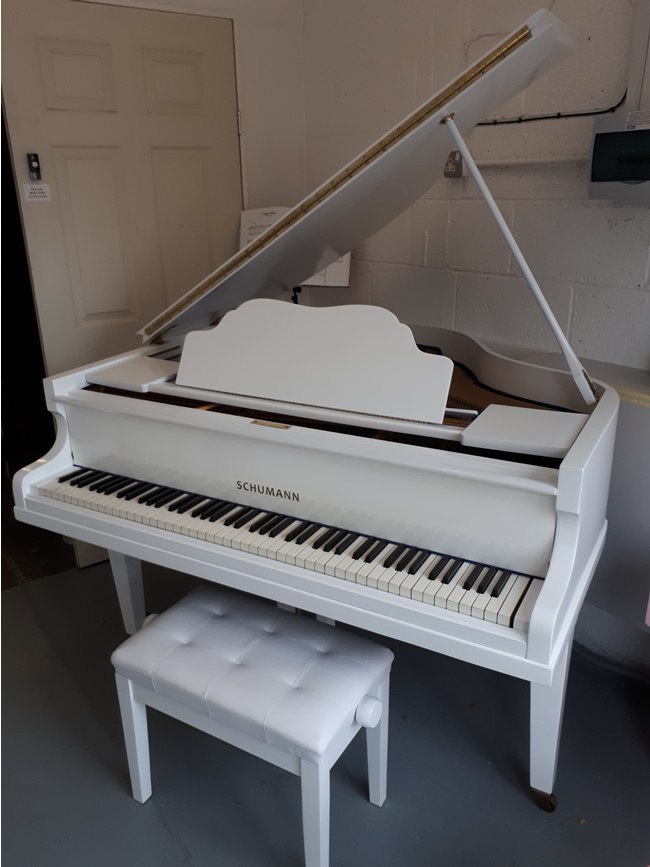 Schumann English White Gloss Baby grand piano for sale or rental.
