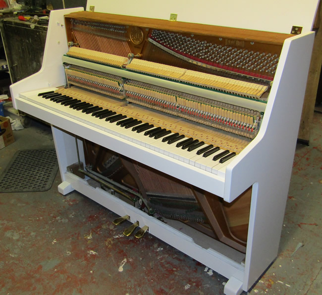  Urk & Sons piano in a White satin finish.