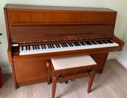 Yamaha C110 upright piano