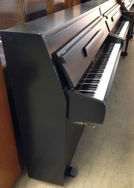 Black satin zender piano.