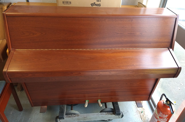 Zender piano cabinet