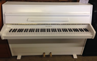 Zender white piano.