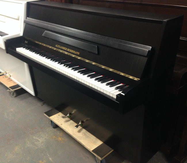 Alexander Hermann upright piano in a Black satin finish.