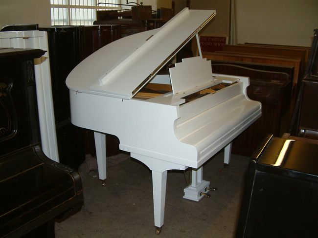 White grand pianos