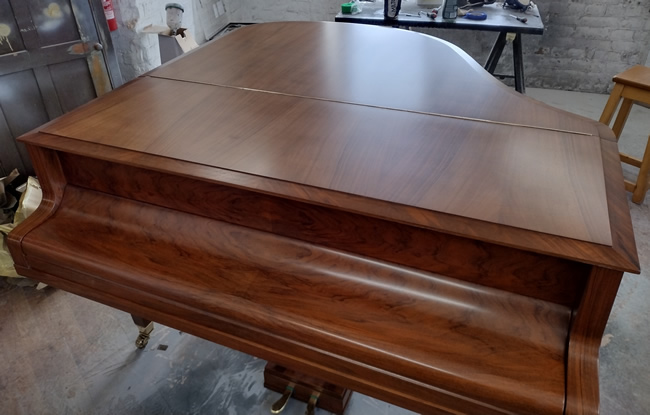 bluthner-walnut-baby-grand-front-view