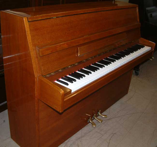 Steinfeld teak upright piano for sale. 