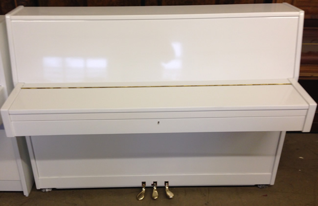 White modern pianos