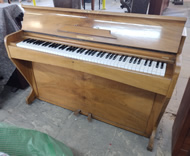 Consolette small upright piano