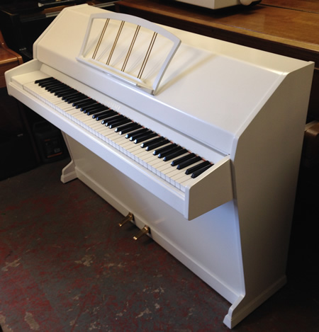 Sideview of eavestaff miniroyal piano.