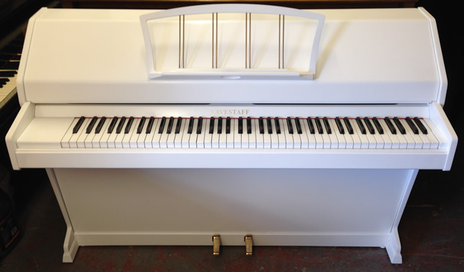 Eavestaff miniroyal in a white cabinet.