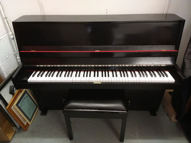 Fazer piano in a black satin finish.