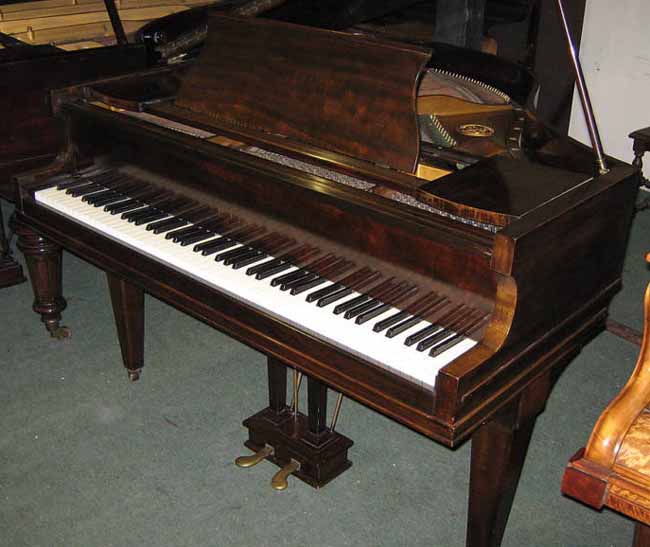 Rogers baby grand before being restored