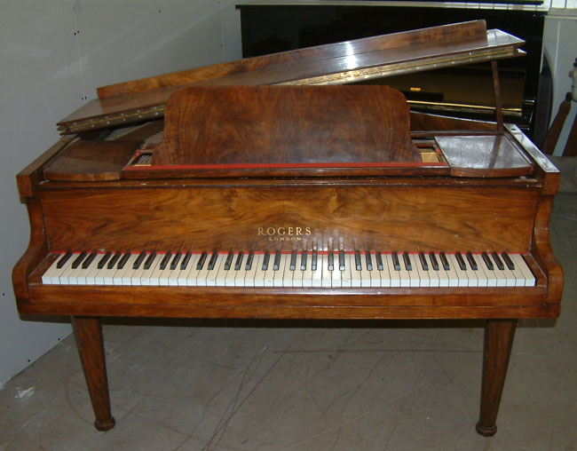 Walnut Rogers baby grand pianos