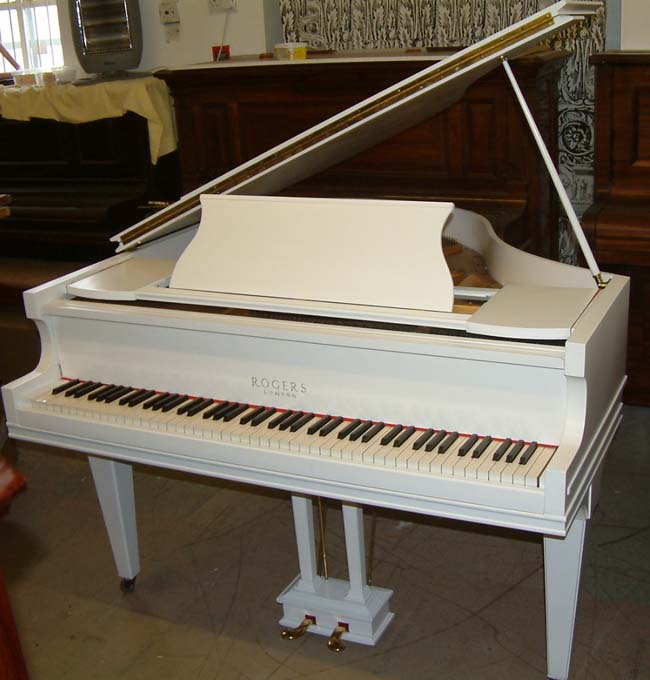 White baby grand piano