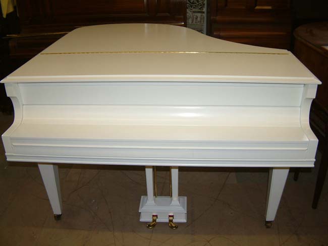 White satin grand piano