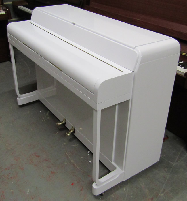 Kemble Minx piano wrapped in white gloss.