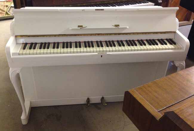White Kemble pianos