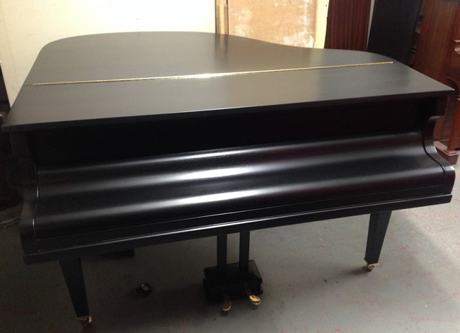 Murdoch black satin piano.