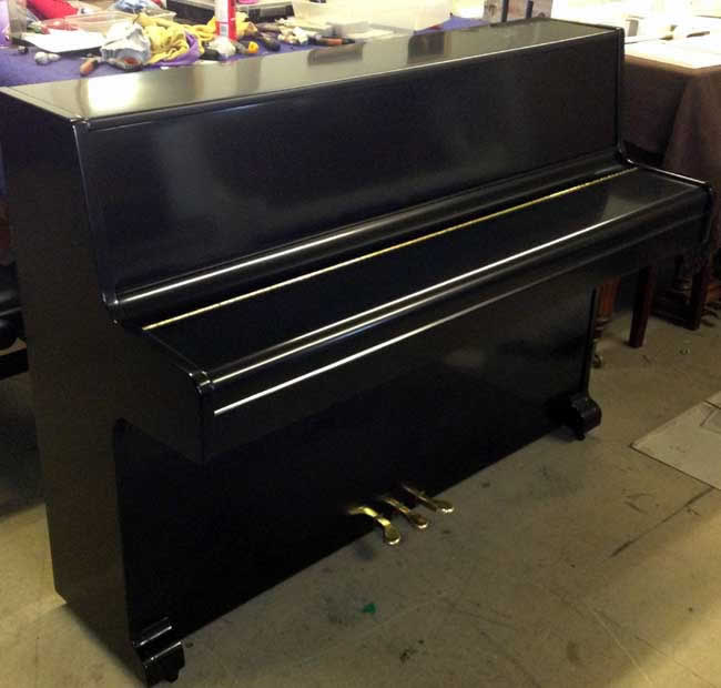 Offenbach second hand modern upright piano to be re polished in a white or black satin finish