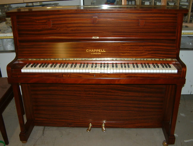 Chappell reconditioned and repolished upright piano.