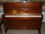 Chappell Reconditioned upright piano.