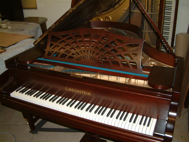 Bechstein Model B repolished in a Rosewood satin finish.