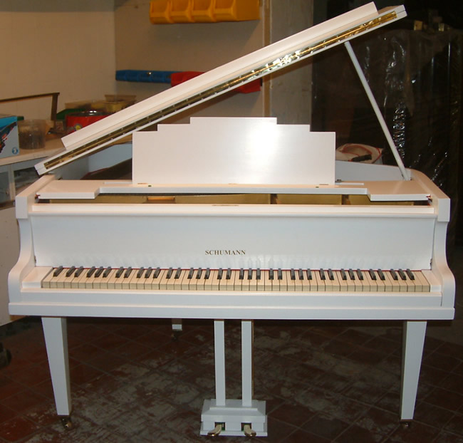 Schumann baby grand piano. 