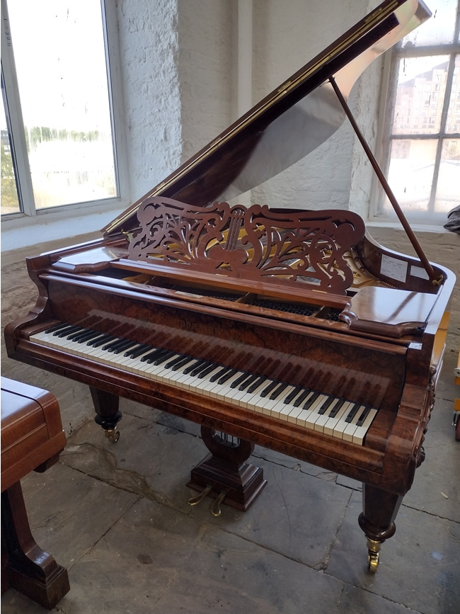 Sheidmayer grand in burr walnut with a gloss finish