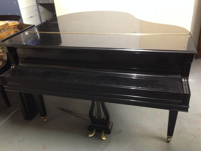 Restored Baby Grand Piano